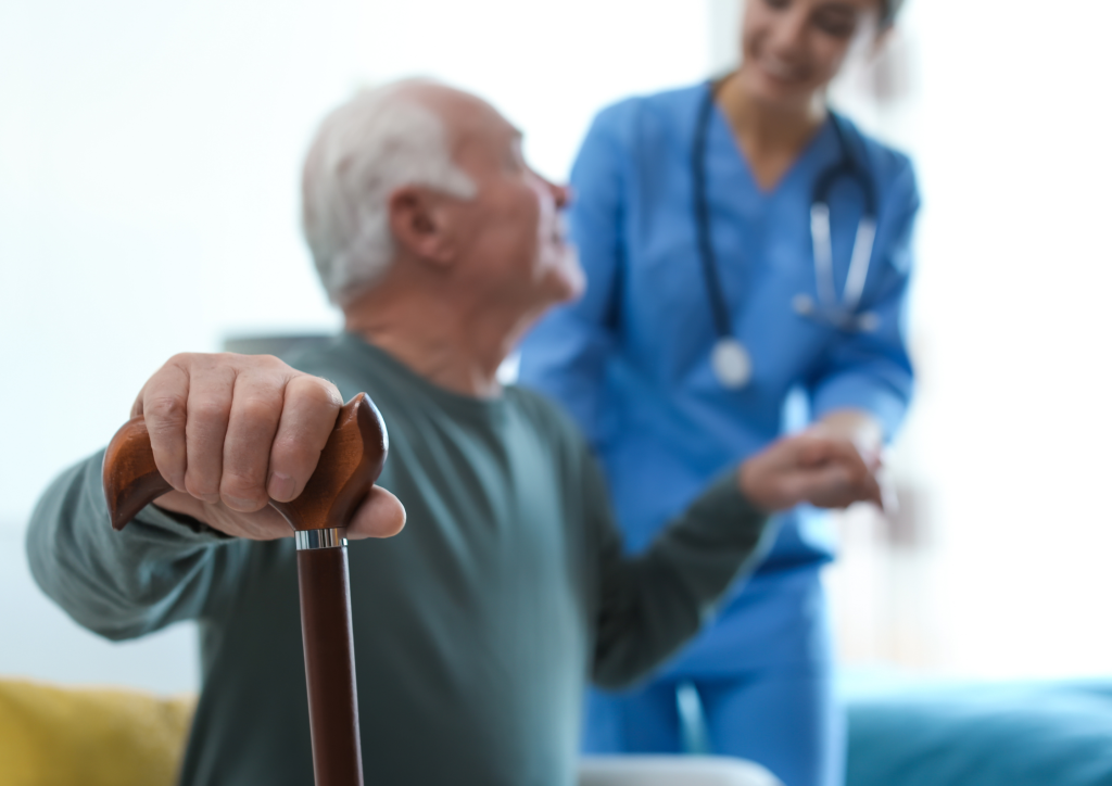 Care worker assisting elderly person in UK - 2025 visa changes