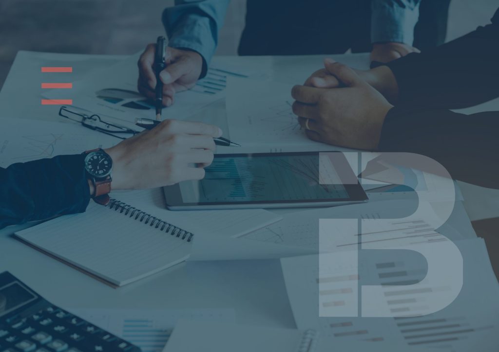 Business professionals reviewing right to work compliance documents ahead of the 2026 illegal working rule changes.